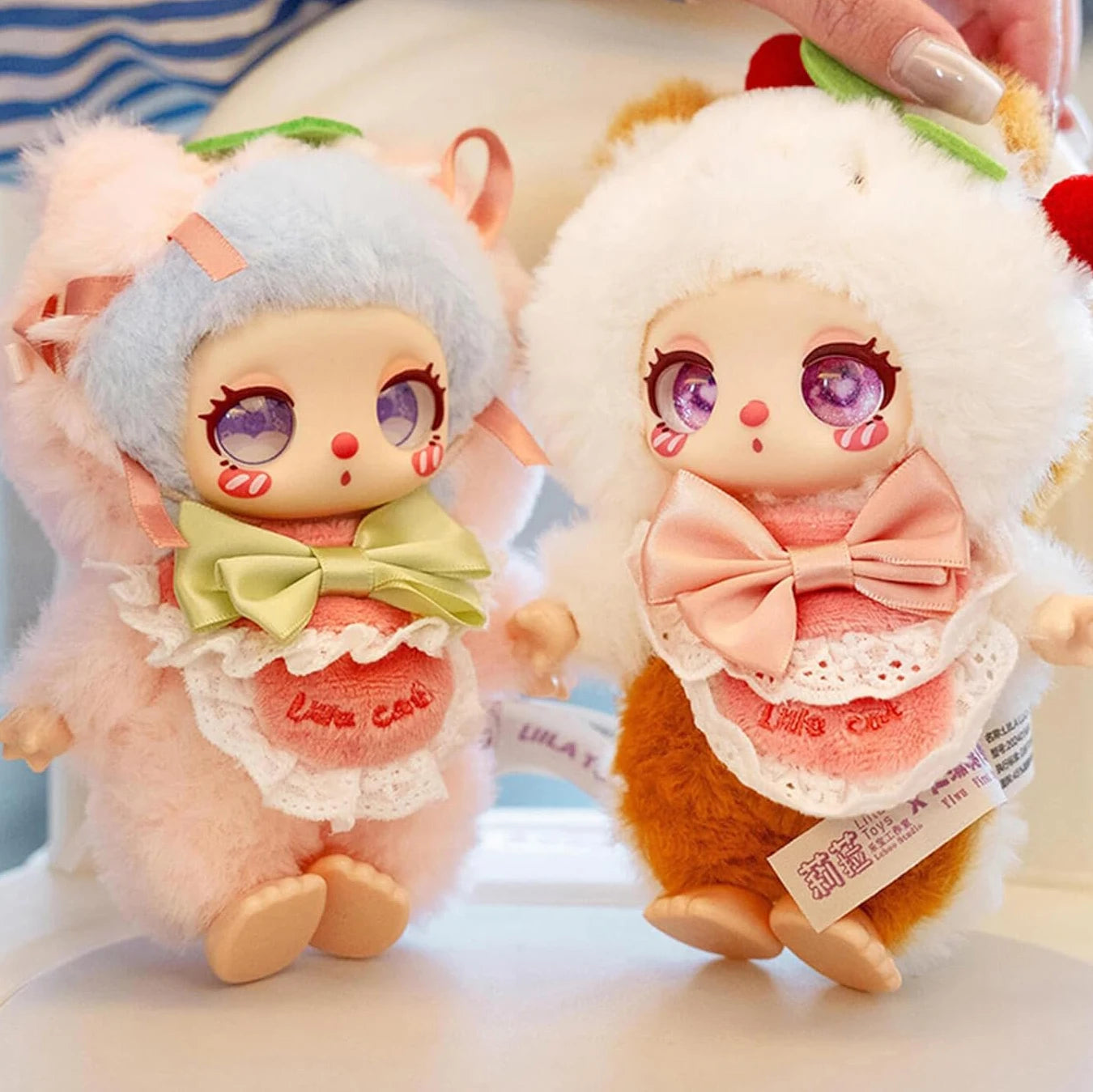 Baby Three - Liila's Chef Kitten Blind Box plush dolls with pastel bows, glass-look eyes, and dessert-themed outfits in soft fabrics.