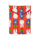 Puffy laptop case, red with repeating bunnies and blue flower pattern