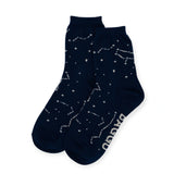 Crafted from soft bamboo rayon, the Baggu Crew Sock - Constellation Midnight features mesmerizing white star patterns against a navy backdrop. With "Baggu" elegantly printed on the sole, these socks offer both style and comfort for a cosmic touch to your wardrobe.