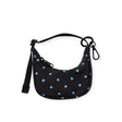 Crescent bag charm pouch with blue micro dots on black, with hanging loop