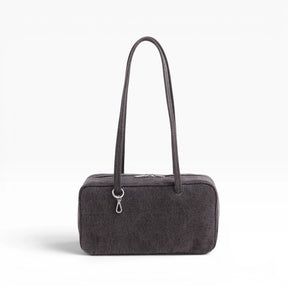 Baggu washed black denim bowler bag with top handles and zip closure.