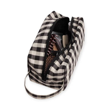 Black and cream gingham toiletry dopp kit with zip top, open view inside
