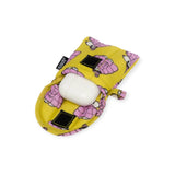 The Peanuts x Baggu Earbuds Case - Snoopy Puffer by Baggu is a delightful accessory featuring a white casing nestled in a yellow fabric pouch with pink grenade patterns and a black fastener tab. Ideal for fans seeking playful style, it's perfect as an earbuds case or Snoopy Puffer accessory.