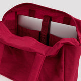 Cherry red tote bag interior with zip opening and inner sleeve pocket
