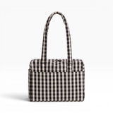 Black-and-cream gingham tote bag with structured rectangular shape and handles