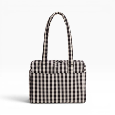 Black-and-cream gingham tote bag with structured rectangular shape and handles