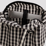 Gingham tote interior with black plastic zipper pull and pocket divider