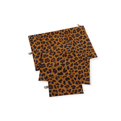 Three leopard print fabric zipper pouches in large, medium, and small sizes stacked on white background