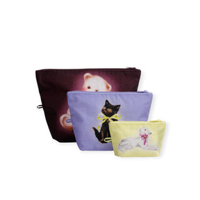 Go pouch set with three animal-print pouches: burgundy, lavender, and pale yellow