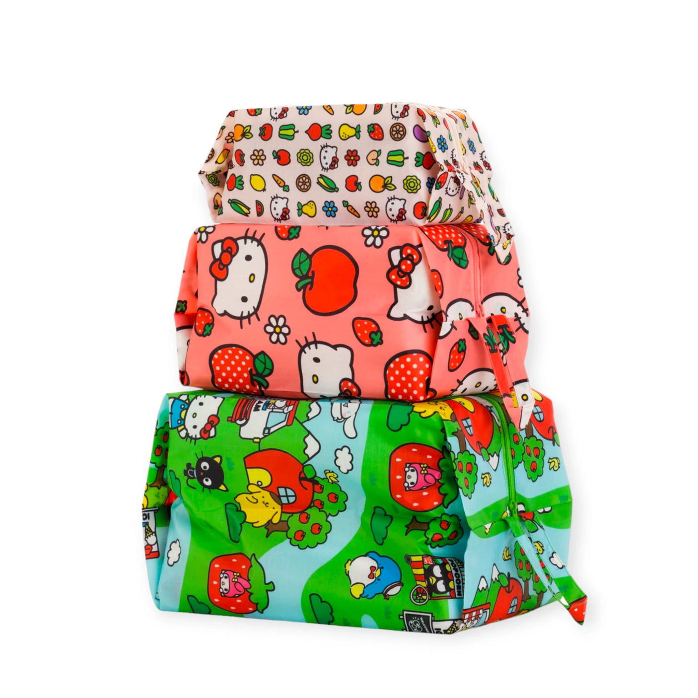 Explore the charming Hello Kitty x Baggu - Storage & Travel Set by Baggu, which includes three rectangular pouches adorned with lively cartoon characters and fruity patterns on a white, pink, and green background. Perfect for stylishly organizing your essentials.