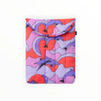 Puffy 13–14-inch laptop case with purple orange dolphin pattern and rounded flap