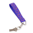 Baggu logo keychain strap, blue with orange smiley icons, metal key ring holding two keys