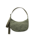 Medium crescent nylon bag in green with curved open top and adjustable shoulder strap