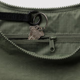 Crescent bag interior close-up with zipper, key ring, and Baggu logo pull tab