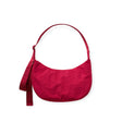 Cherry red nylon crescent bag with top handle and front hanging tag loop