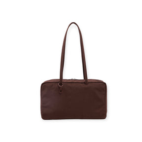 Dark brown rectangular fabric shoulder bag with long dual straps and top zipper closure on white background