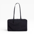 Medium nylon bowler bag in black with top handles and side zipper