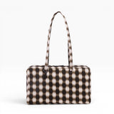 Baggu medium nylon bowler bag with blurred black-and-cream gingham and top handles