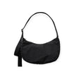 Medium crescent nylon hobo bag in black, with studded strap accents