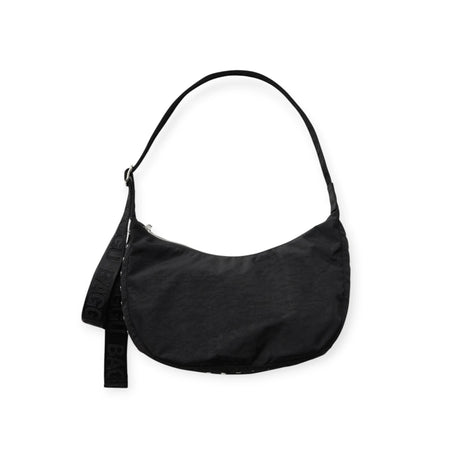 Medium crescent nylon hobo bag in black, with studded strap accents