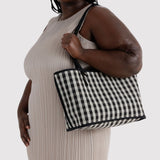Black-and-white checkered nylon medium tote with top handles and zip closure