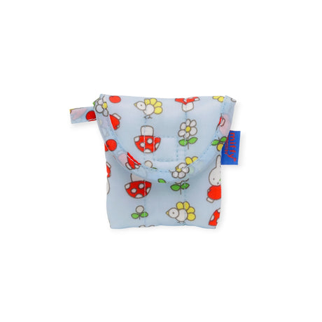 Light blue Miffy x Baggu puffy earbuds case with red mushrooms and white flowers, front view, baggu_miffy_puffy-earbuds.webp