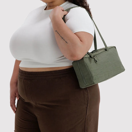 Baggu nylon bowler bag in olive green, zip top and short handles