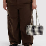 Black and cream gingham nylon bowler bag with top handles and side seams