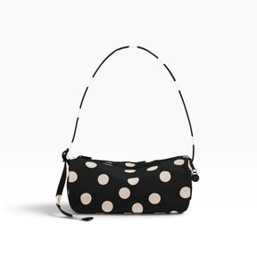 Baggu black nylon loaf bag with cream polka dots and top handle