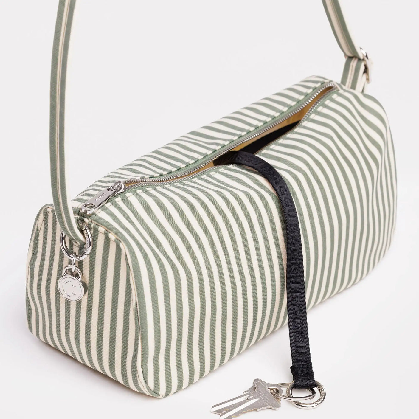 Sage striped nylon loaf bag with top zipper and adjustable shoulder strap