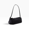 Black nylon loaf shoulder bag with top handle and rounded front seam