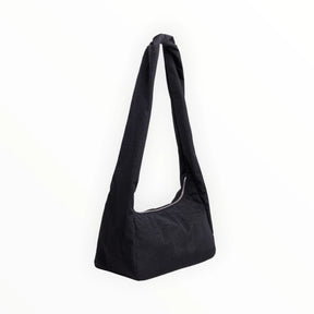 Black nylon tote bag with long handles and curved open top