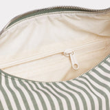Sage stripe nylon bag interior with zip top and light fabric lining