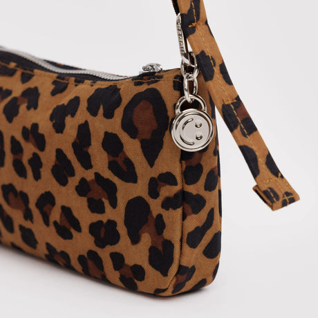 Baggu leopard print nylon pochette side with D-ring strap and silver zipper pull