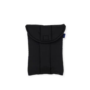 The Baggu Puffy 8" Tablet Sleeve in black, by Baggu, is made from recycled nylon and features padded protection, a flap closure, and visible stitching, shown against a white background.