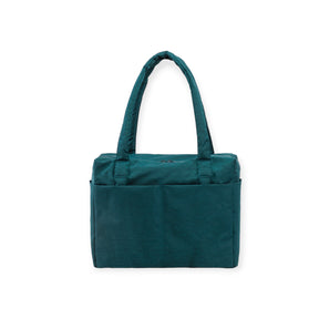Teal fabric tote bag with dual handles and large exterior pockets on plain white background