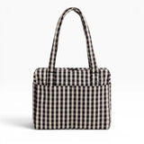 Baggu small carry-on tote bag in black-and-cream gingham, top handles