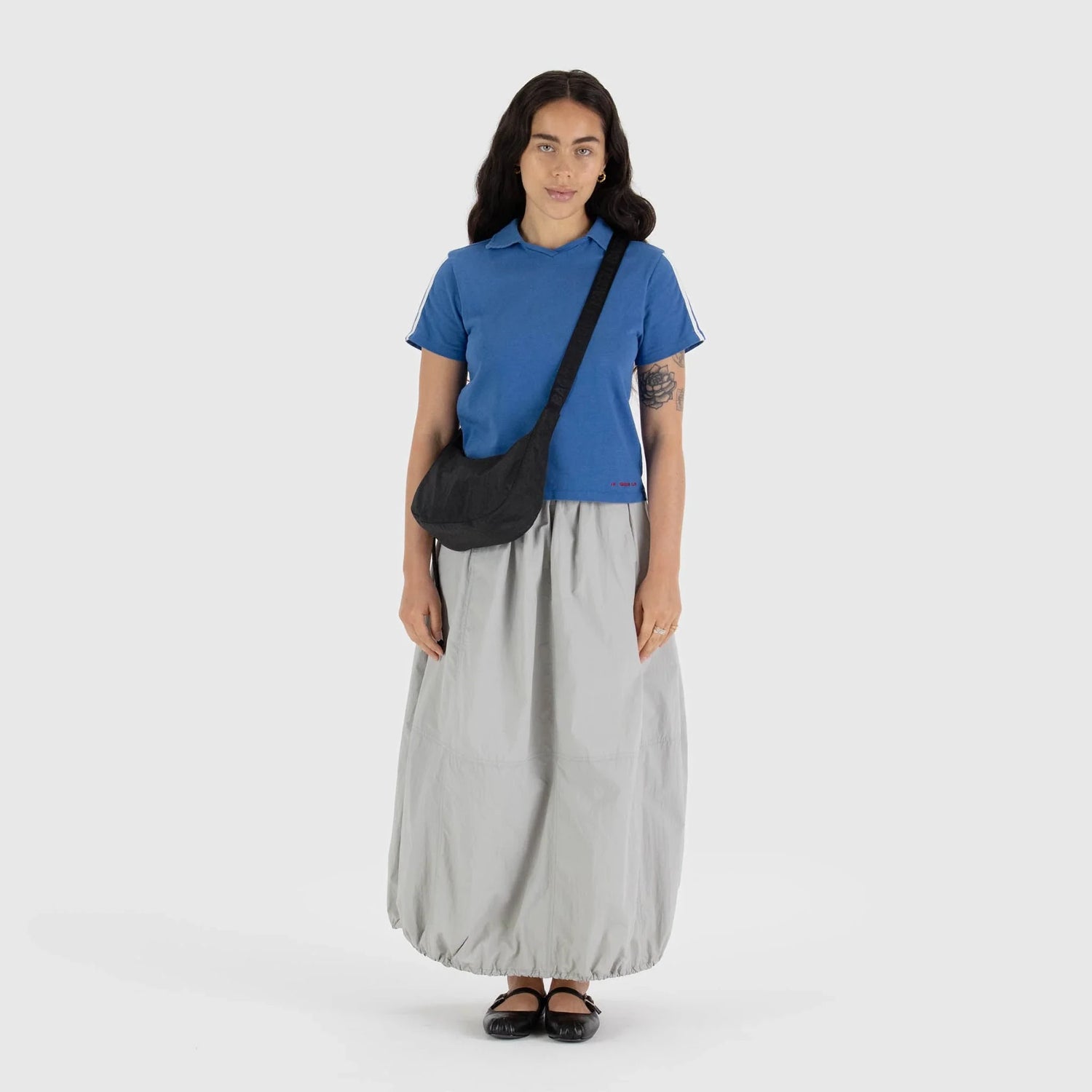 Black Baggu crescent crossbody bag with adjustable strap and long tie