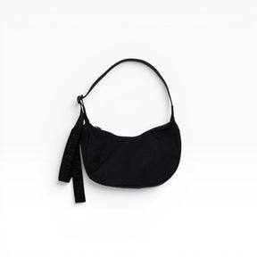 Black Baggu small nylon crescent bag with drawstring strap and dangling key tag