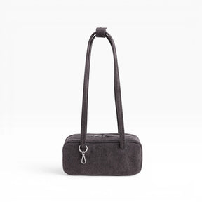 Small washed black denim bowler bag with arched handles and front top zipper