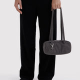Small washed black denim bowler bag with top zipper and two short handles