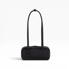 Baggu small bowler bag in black with two top handles and zip closure.