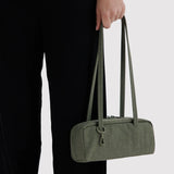 Olive small bowler bag with two top handles and zipper closure.