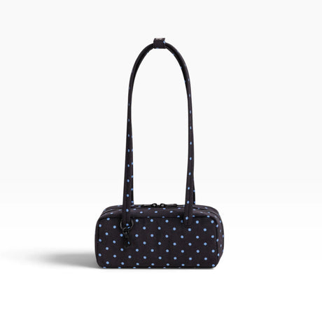 Small bowler bag in black with sky-blue micro dot pattern and top zip closure