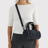 Black and sky blue micro dot small nylon duffle bag worn crossbody