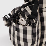 Duffel bag hardware: gingham fabric with carabiner clasp and strap clips