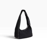 Small black nylon hobo bag with studded handle straps and curved shape