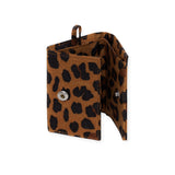 The Baggu Snap Wallet - Leopard is a trifold design with snap closures, made from recycled nylon. It features two compartments and offers the convenience of being machine washable.