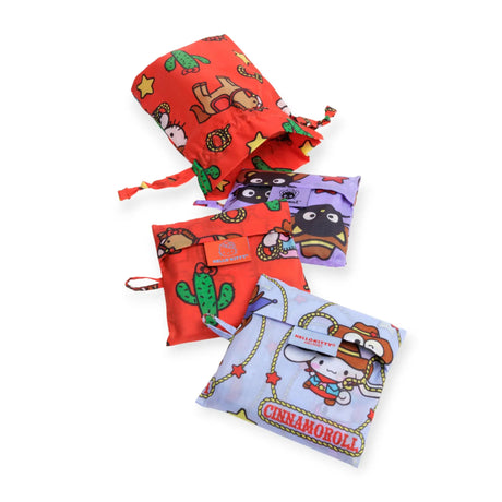 Printed drawstring pouches in red, purple, and light blue with tied cords