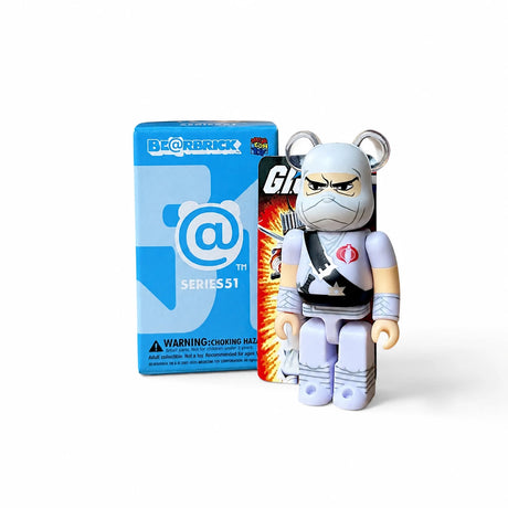 BearBrick Series 51 blind box figure in white outfit with blue logo on packaging